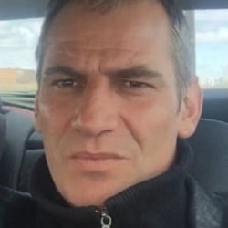 J.