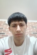 Достонбек