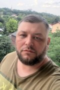 Николай