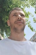 Николай