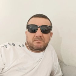 Али