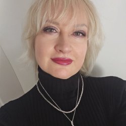 Мила