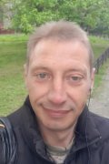 В.