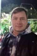 Николай