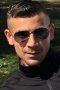 V.
